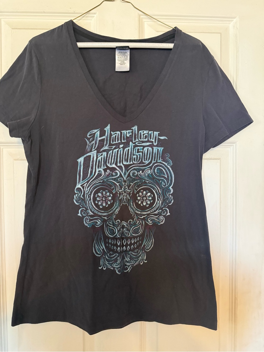 Harley-Davidson Black V-Neck Skull Graphic Tee with Teal Accents